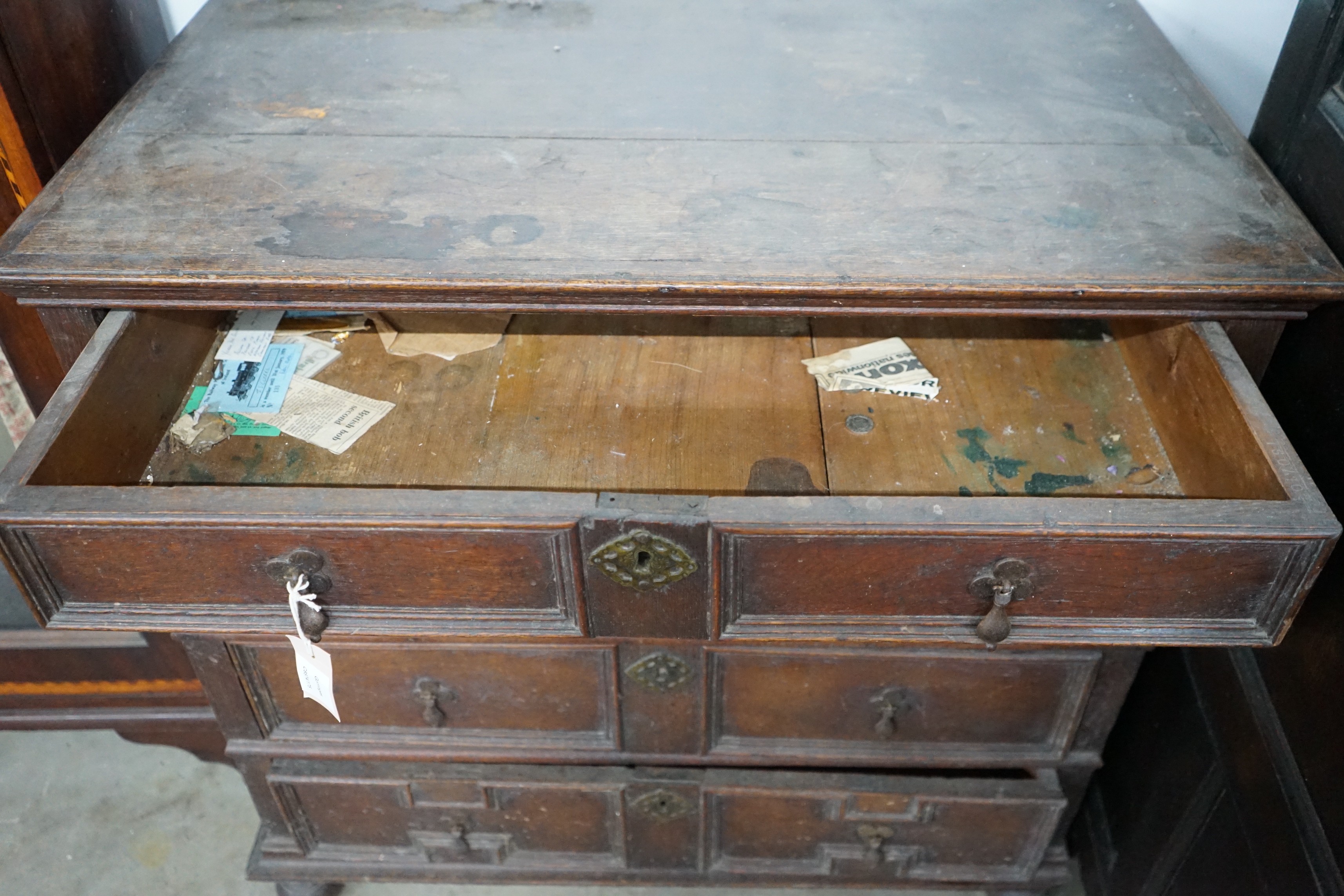 A 17th century oak chest of four drawers, width 93cm, depth 53cm, height 91cm